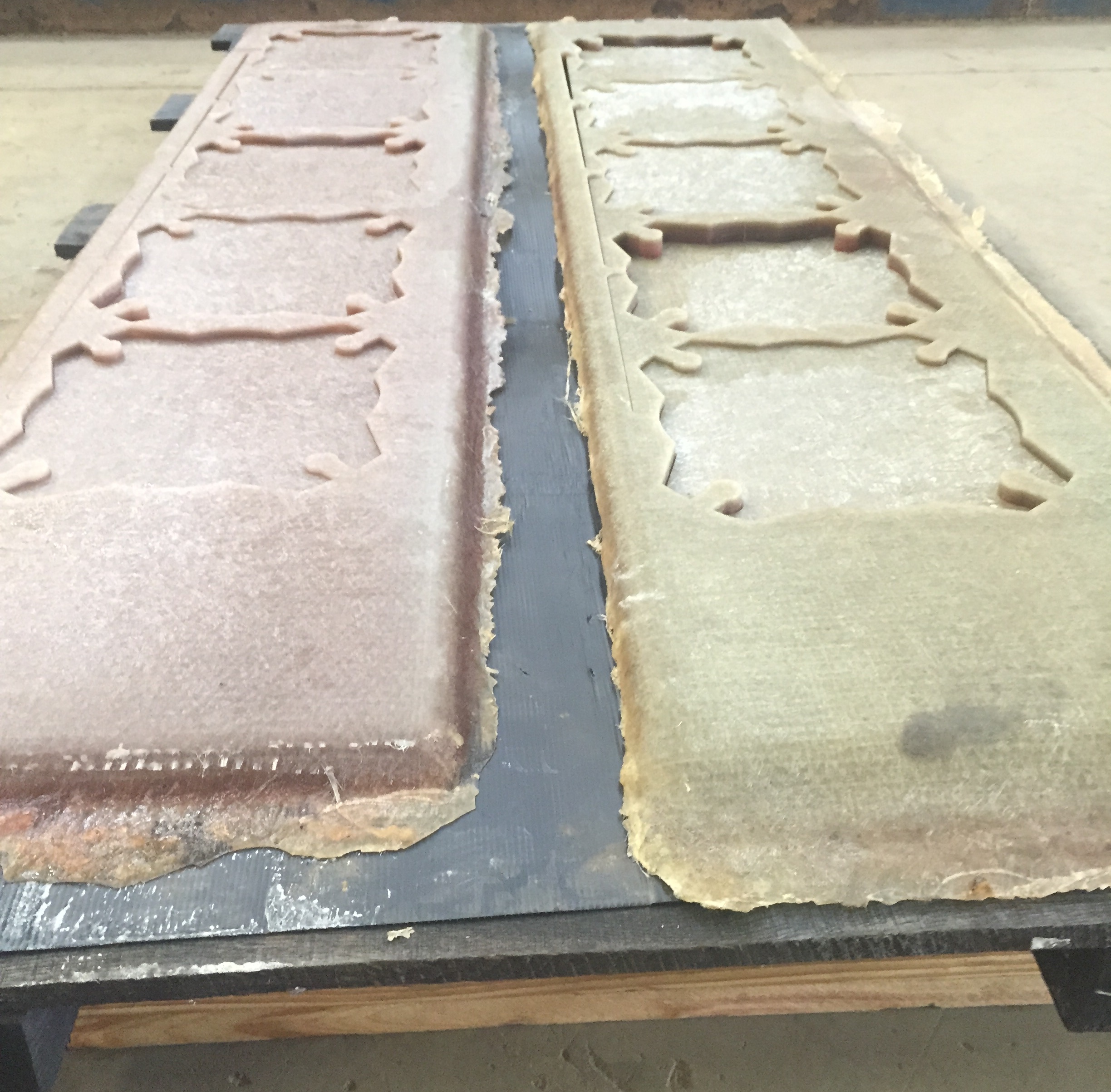 Pieces of fiberglass cut by a Water Jet